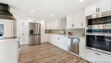 This rare lakefront villa-esque condo is one of only 2 units in - photo 4