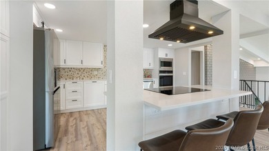 This rare lakefront villa-esque condo is one of only 2 units in - photo 8