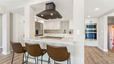 This rare lakefront villa-esque condo is one of only 2 units in - photo 10