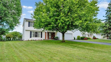 Well-maintained 1,872 sq. ft. colonial featuring 3 bedrooms, 1.5 - photo 2
