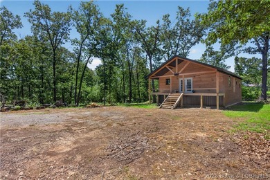 This 3 bed 2 bath Truman Lake home presents you with an amazing - photo 8