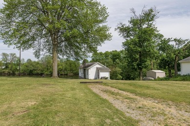 Tucked along the scenic St. Joseph River in Three Rivers, this - photo 33