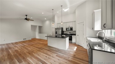 IN THE HEART OF OSAGE BEACH, your Lake of the Ozarks life starts - photo 10