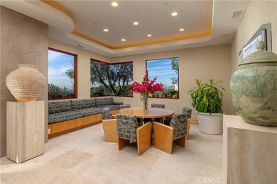 Set behind the guarded and patrolled gates of Pelican Hill in - photo 11