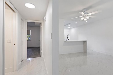 Fabulous ground level, bright just remodeled unit in the very