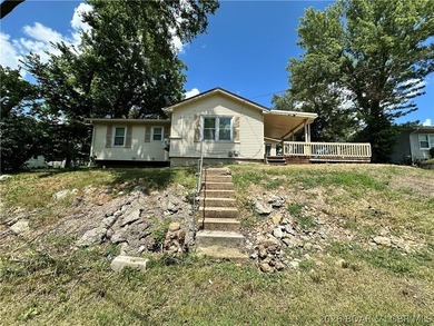 2-bedroom home conveniently located just minutes from the - photo 1