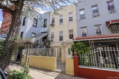 Welcome to 276 Woodbine Street, a substantial multi-family - photo 1