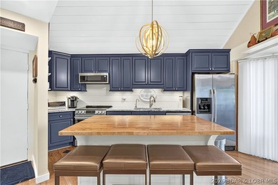 Distinctive architecture meets effortless lake living in this - photo 2