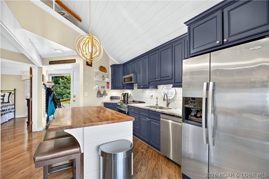 Distinctive architecture meets effortless lake living in this - photo 3