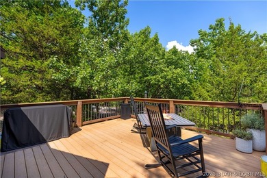 Distinctive architecture meets effortless lake living in this - photo 7