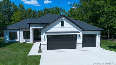 NEW CONSTRUCTION in Porto Cima! This modern ranch delivers the - photo 1
