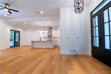 NEW CONSTRUCTION in Porto Cima! This modern ranch delivers the - photo 4