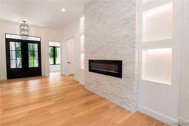 NEW CONSTRUCTION in Porto Cima! This modern ranch delivers the - photo 7