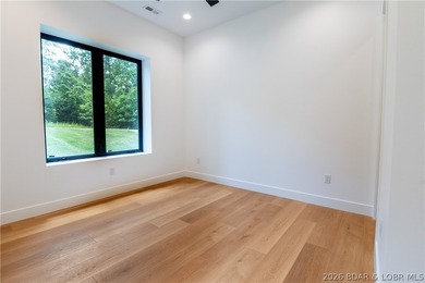NEW CONSTRUCTION in Porto Cima! This modern ranch delivers the - photo 9
