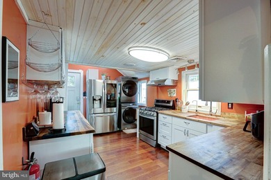 Enjoy waterfront living in this beautifully renovated cottage - photo 44