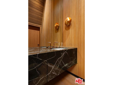 Unparalleled beauty and style define this reimagined ranch - photo 15