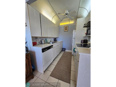 Lake Condo For Sale in Deerfield Beach, Florida