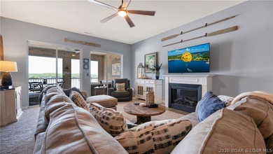 Experience refined lakefront living in this fully updated - photo 2