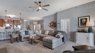 Experience refined lakefront living in this fully updated - photo 4
