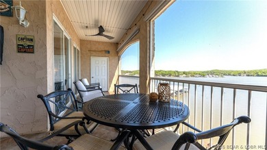 Experience refined lakefront living in this fully updated - photo 10