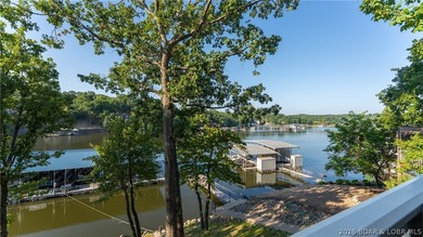 Enjoy the best of Lake of the Ozarks from this beautifully - photo 2