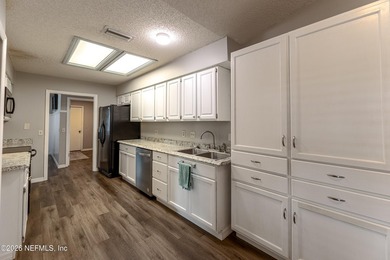 Welcome to 8801 Ivy Mill Place N, a charming cottage-inspired - photo 22