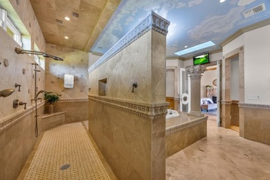 Perched high above the coastline within the private gated - photo 28
