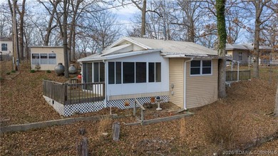 Discover affordable lake living at its best! Nestled in a - photo 2