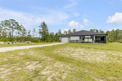 Behind the gated entry, a private estate unfolds across more - photo 10