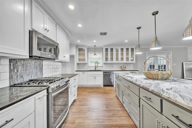 ULTIMATE FLEXIBILITY and LUXURY, REMODELED 4 BED, 3 BATH HOME ON - photo 2