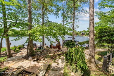 Lakefront living doesn't get better than this. Nestled on the - photo 12