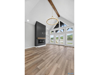 Experience turnkey waterfront living in this brand-new 3-bedroom - photo 12