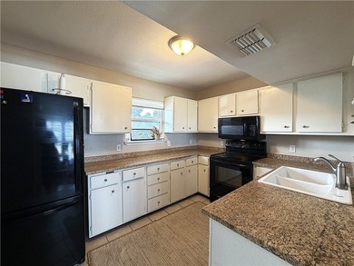 Second story Condo in Jackson's Landing with two car garage, two - photo 15