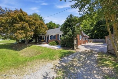 Welcome home to this beautifully updated brick ranch nestled in - photo 2