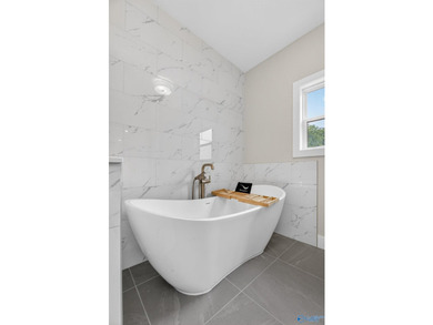 Experience turnkey waterfront living in this brand-new 3-bedroom - photo 24