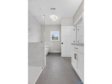 Experience turnkey waterfront living in this brand-new 3-bedroom - photo 25