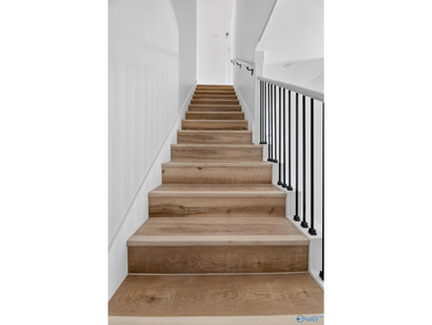 Experience turnkey waterfront living in this brand-new 3-bedroom - photo 29