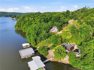 Build your dream lake home on this exceptional waterfront lot in - photo 2