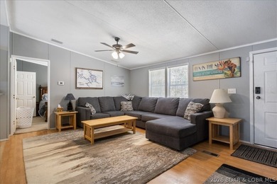 Discover this beautifully updated 4-bedroom, 3-bath lakefront - photo 2