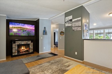 Discover this beautifully updated 4-bedroom, 3-bath lakefront - photo 3