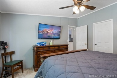 Discover this beautifully updated 4-bedroom, 3-bath lakefront - photo 5