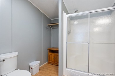 Discover this beautifully updated 4-bedroom, 3-bath lakefront - photo 6