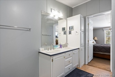 Discover this beautifully updated 4-bedroom, 3-bath lakefront - photo 7