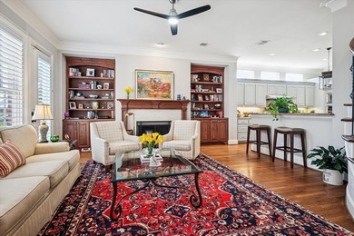 Welcome to refined, lock-and-leave luxury in this stunning