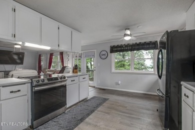 BRAND NEW ROOF! This waterfront family home has been in the - photo 13