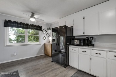 BRAND NEW ROOF! This waterfront family home has been in the - photo 14
