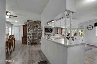 BRAND NEW ROOF! This waterfront family home has been in the - photo 20