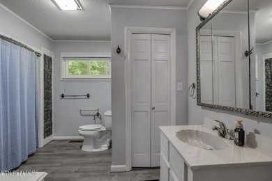 BRAND NEW ROOF! This waterfront family home has been in the - photo 29