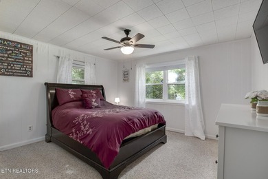 BRAND NEW ROOF! This waterfront family home has been in the - photo 35