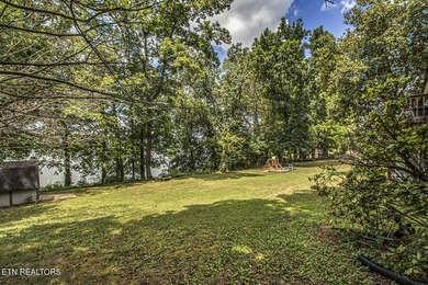 BRAND NEW ROOF! This waterfront family home has been in the - photo 46